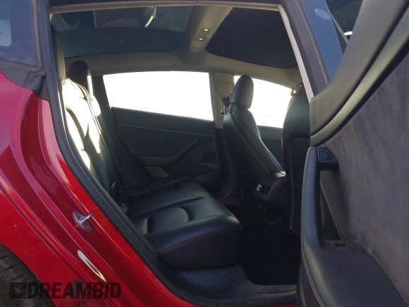 2022 Tesla Model 3 with VIN 5YJ3E1EA1NF288903, listed as a IAAI auction lot 41610215 with 96,050 mi miles and . Bid and sale history available at DreamBid. Image 8.