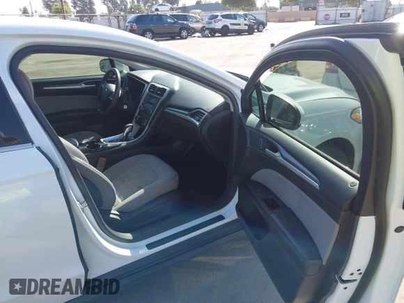 2016 Ford Fusion S z VIN 3FA6P0G79GR157809, wystawiony jako IAAI lot #41994860 z przebiegiem 161 049 mil mil oraz . Historia ofert i sprzedaży dostępna na DreamBid. Obrazek 5.