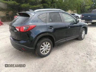 2014 Mazda CX-5 Touring z VIN JM3KE2CYXE0429149, wystawiony jako IAAI lot #42471772 z przebiegiem 222 440 mil mil oraz . Historia ofert i sprzedaży dostępna na DreamBid. Obrazek 4.