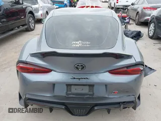 2021 Toyota Supra 2.0 with VIN WZ1DB2C0XMW038679, listed as a IAAI auction lot 42407988 with 76,316 mi miles and . Bid and sale history available at DreamBid. Image 17.