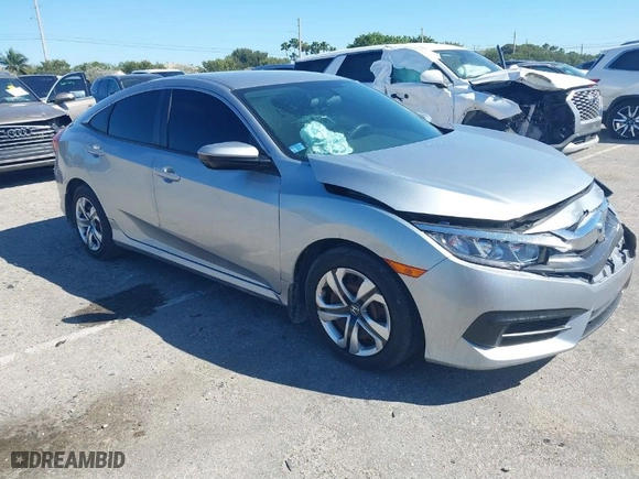 2017 Honda Civic Sedan LX with VIN 19XFC2F52HE038428, listed as a IAAI auction lot 41781577 with 72,730 mi miles. Bid and sale history available at carsss.com. Image 1.