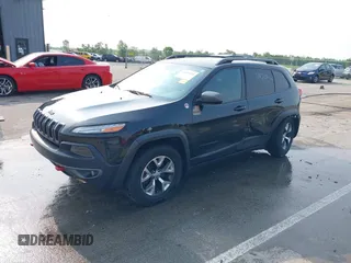 2015 Jeep Cherokee Trailhawk with VIN 1C4PJMBS6FW786622, listed as a IAAI auction lot 42403215 with 148,205 mi miles and . Bid and sale history available at DreamBid. Image 17.