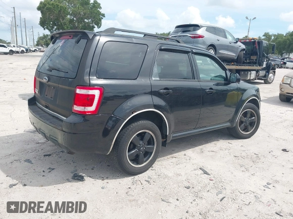 2011 Ford Escape XLT z VIN 1FMCU9D72BKB56864, wystawiony jako IAAI lot #42699907 z przebiegiem 152 567 mil mil oraz . Historia ofert i sprzedaży dostępna na DreamBid. Obrazek 4.