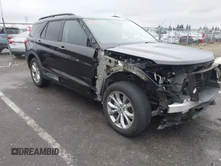2021 Ford Explorer XLT z VIN 1FMSK8DH9MGA41477, wystawiony jako IAAI lot #41609763 z przebiegiem 72 859 mil mil oraz . Historia ofert i sprzedaży dostępna na DreamBid. Obrazek 1.