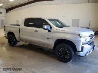 2019 Chevrolet Silverado 1500 LTZ with VIN 3GCPWEED1KG165608, listed as a Copart auction lot 52048855 with 87,494 mi miles and Clean Title. Bid and sale history available at carsss.com. Image 4.
