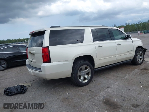 2015 Chevrolet Suburban LTZ with VIN 1GNSKKKC4FR687923, listed as a IAAI auction lot 42192062 with 139,873 mi miles and . Bid and sale history available at DreamBid. Image 4.