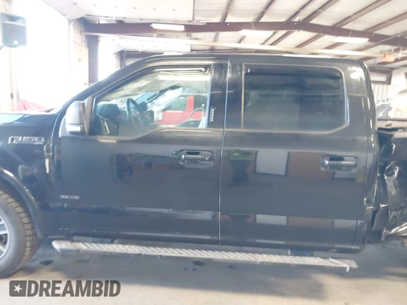 2015 Ford F-150 XLT with VIN 1FTFW1EF3FKD51350, listed as a IAAI auction lot 41413942 with 125,877 mi miles and . Bid and sale history available at carsss.com. Image 15.