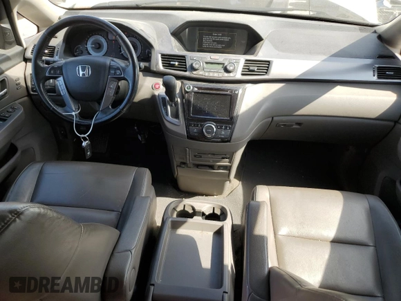 2014 Honda Odyssey Touring z VIN 5FNRL5H92EB059168, wystawiony jako Copart lot #76121914 z przebiegiem 264 715 mil mil oraz Szkoda całkowita • Salvage title. Historia ofert i sprzedaży dostępna na DreamBid. Obrazek 8.