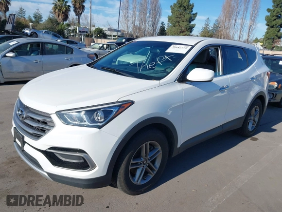 2017 Hyundai Santa Fe 2.4L z VIN 5XYZT3LB2HG383765, wystawiony jako IAAI lot #38642722 z przebiegiem 76 420 mil mil oraz . Historia ofert i sprzedaży dostępna na DreamBid. Obrazek 2.