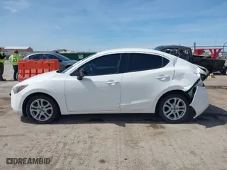 2017 Toyota Yaris iA with VIN 3MYDLBYV9HY185026, listed as a IAAI auction lot 41834005 with 57,025 mi miles. Bid and sale history available at carsss.com. Image 14.