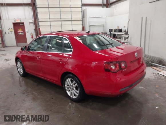 2010 Volkswagen Jetta TDI z VIN 3VWRL7AJ3AM178141, wystawiony jako IAAI lot #41467916 z przebiegiem 225 349 mil mil oraz . Historia ofert i sprzedaży dostępna na DreamBid. Obrazek 3.