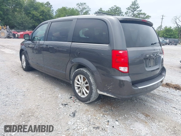 2018 Dodge Grand Caravan SXT z VIN 2C4RDGCG2JR248576, wystawiony jako IAAI lot #42203411 z przebiegiem 100 815 mil mil oraz . Historia ofert i sprzedaży dostępna na DreamBid. Obrazek 3.