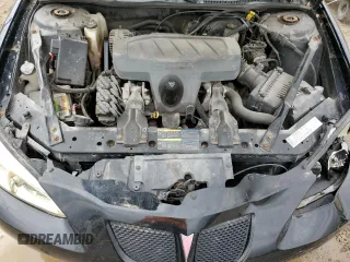 2005 Pontiac Grand Prix z VIN 2G2WP522451353570, wystawiony jako Copart lot #54862415 z przebiegiem 221 492 mil mil oraz Szkoda całkowita • Salvage title. Historia ofert i sprzedaży dostępna na DreamBid. Obrazek 11.