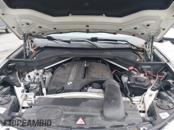 2014 BMW X5 xDrive35i with VIN 5UXKR0C56E0H18800, listed as a IAAI auction lot 40843200 with 129,991 mi miles. Bid and sale history available at carsss.com. Image 10.