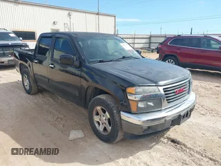 2012 GMC Canyon SLE1 z VIN 1GTD5MFE0C8133103, wystawiony jako IAAI lot #42193321 z przebiegiem 168 277 mil mil oraz . Historia ofert i sprzedaży dostępna na DreamBid. Obrazek 1.