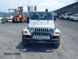 2004 Jeep Wrangler Sport with VIN 1J4FA49S04P781581, listed as a IAAI auction lot 42078693 with 111,123 mi miles and . Bid and sale history available at DreamBid. Image 12.