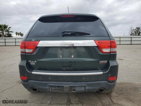 2011 Jeep Grand Cherokee Overland with VIN 1J4RR6GT4BC713527, listed as a Copart auction lot 49399445 with 145,242 mi miles and Salvage Title. Bid and sale history available at carsss.com. Image 6.