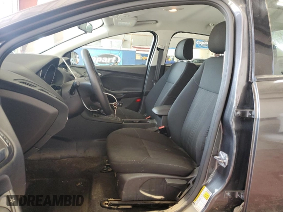 2018 Ford Focus SE z VIN 1FADP3F25JL257815, wystawiony jako Copart lot #61978045 z przebiegiem 62 328 mil mil oraz Szkoda całkowita • Salvage title. Historia ofert i sprzedaży dostępna na DreamBid. Obrazek 7.