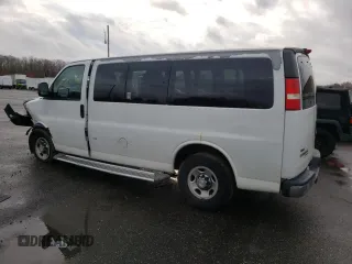 2012 Chevrolet Express Passenger 1LT with VIN 1GAZGYFG3C1118315, listed as a Copart auction lot 80870104 with 122,178 mi miles and Salvage title. Bid and sale history available at DreamBid. Image 2.