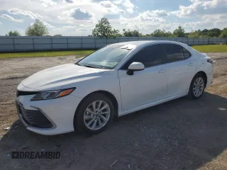 2023 Toyota Camry LE z VIN 4T1C11AK9PU750530, wystawiony jako Copart lot #56609735 z przebiegiem 20 172 mil mil oraz Szkoda całkowita • Salvage title. Historia ofert i sprzedaży dostępna na DreamBid. Obrazek 1.