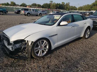 2018 Jaguar XJ Portfolio with VIN SAJWA2G76J8W13668, listed as a Copart auction lot 59424963 with 27,983 mi miles and . Bid and sale history available at DreamBid. Image 1.