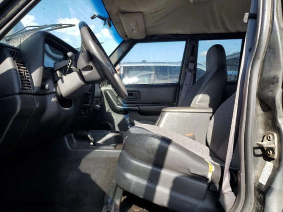 2000 Jeep Cherokee Police with VIN 1J4FF48S1YL246243, listed as a Copart auction lot 84954674 with 0 mi miles and Salvage Title. Bid and sale history available at carsss.com. Image 7.