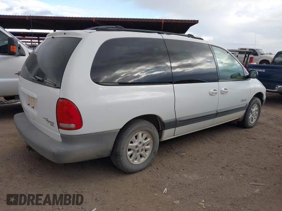 1999 Plymouth Voyager Grand SE z VIN 1P4GP44G5XB637050, wystawiony jako IAAI lot #41702235 z przebiegiem 335 309 mil mil oraz . Historia ofert i sprzedaży dostępna na DreamBid. Obrazek 4.