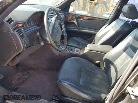 1998 Mercedes-Benz E-Class with VIN WDBJF65F4WA646422, listed as a Copart auction lot 88982785 with 281,524 mi miles and Salvage Title. Bid and sale history available at carsss.com. Image 7.
