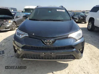 2017 Toyota RAV4 SE with VIN JTMNFREV7HJ142221, listed as a Copart auction lot 86334074 with 123,165 mi miles and Salvage title. Bid and sale history available at DreamBid. Image 5.