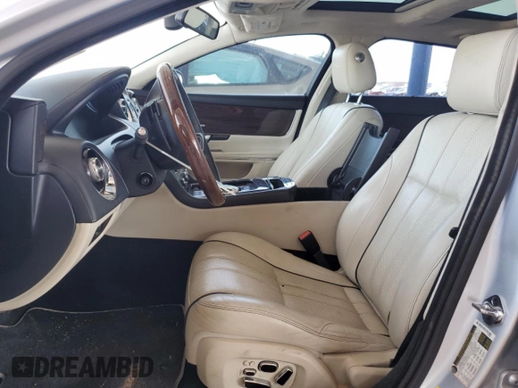 2012 Jaguar XJ Supercharged with VIN SAJWA2GE1CMV28584, listed as a Copart auction lot 63313275 with 74,023 mi miles and Clean title. Bid and sale history available at DreamBid. Image 7.