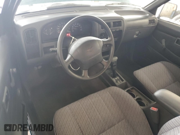1997 Nissan Frontier XE with VIN 1N6SD16SXVC346717, listed as a Copart auction lot 55442215 with 112,343 mi miles and Salvage title. Bid and sale history available at DreamBid. Image 8.