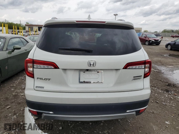 2020 Honda Pilot Touring 8-Passenger with VIN 5FNYF6H99LB050134, listed as a Copart auction lot 55095435 with 26,080 mi miles and Salvage title. Bid and sale history available at DreamBid. Image 6.
