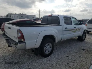 2014 Toyota Tacoma PreRunner with VIN 3TMKU4HN7EM040312, listed as a Copart auction lot 87420864 with 68,853 mi miles and Salvage title. Bid and sale history available at DreamBid. Image 3.