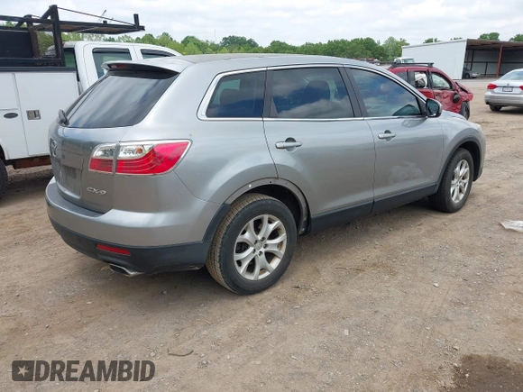 2012 Mazda CX-9 Touring with VIN JM3TB2CV6C0343840, listed as a IAAI auction lot 42221257 with 148,409 mi miles and . Bid and sale history available at carsss.com. Image 4.