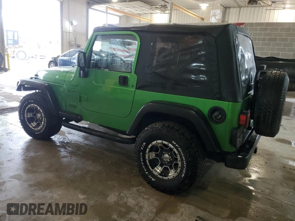 2002 Jeep Wrangler Sport with VIN 1J4FA49S72P701075, listed as a Copart auction lot 66894914 with 169,971 mi miles and Salvage Title. Bid and sale history available at carsss.com. Image 2.