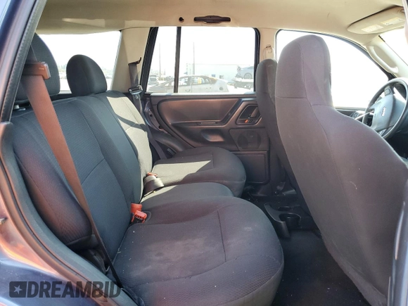 2003 Jeep Grand Cherokee Laredo with VIN 1J4GX48S73C539185, listed as a Copart auction lot 46687915 with 265,008 mi miles and Salvage Title. Bid and sale history available at carsss.com. Image 11.