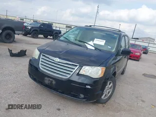 2010 Chrysler Town & Country Touring with VIN 2A4RR5D13AR155611, listed as a IAAI auction lot 42094894 with 132,966 mi miles. Bid and sale history available at carsss.com. Image 2.