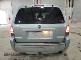 2005 Mercury Mariner Luxury z VIN 4M2CU57135DJ00228, wystawiony jako Copart lot #87603775 z przebiegiem 169 099 mil mil oraz Szkody całkowita. Historia ofert i sprzedaży dostępna na DreamBid. Obrazek 6.