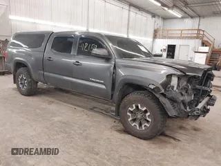 2016 Toyota Tacoma SR5 with VIN 3TMDZ5BN0GM012248, listed as a IAAI auction lot 41215908 with 170,756 mi miles. Bid and sale history available at carsss.com. Image 1.