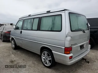 2003 Volkswagen EuroVan MV с VIN WV2NB47083H002700, выставлен на аукционе Copart как лот 76117874 с пробегом 186 942 миль миль и На запчасти • Non repairable. История ставок и продаж доступна на DreamBid. Изображение 2.