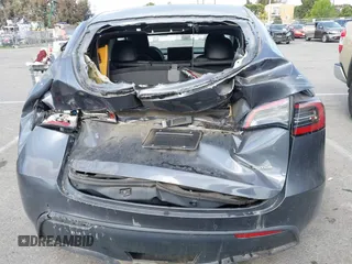 2022 Tesla Model Y Performance with VIN 7SAYGDEF7NF563433, listed as a IAAI auction lot 41713557 with Not Provided miles and . Bid and sale history available at DreamBid. Image 6.