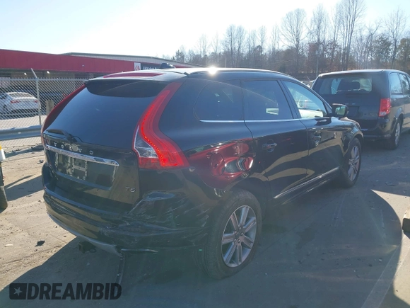 2017 Volvo XC60 Inscription with VIN YV440MDU0H2105432, listed as a IAAI auction lot 41634154 with 106,815 mi miles. Bid and sale history available at carsss.com. Image 4.