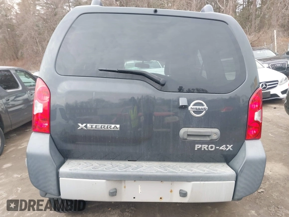 2014 Nissan Xterra X with VIN 5N1AN0NW5EN810488, listed as a IAAI auction lot 41705791 with 127,936 mi miles and . Bid and sale history available at DreamBid. Image 16.