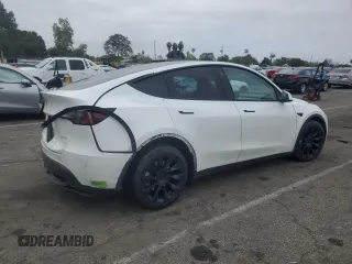 2023 Tesla Model Y Long Range with VIN 7SAYGDEE3PF583883, listed as a Copart auction lot 50920145 with 72,155 mi miles and Salvage Title. Bid and sale history available at DreamBid. Image 3.