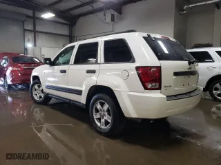2005 Jeep Grand Cherokee Laredo with VIN 1J4HR48N75C679152, listed as a Copart auction lot 46933765 with 221,299 mi miles and Salvage Title. Bid and sale history available at carsss.com. Image 2.
