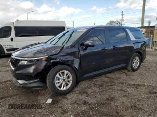 2023 Kia Carnival LX with VIN KNDNB4H38P6255833, listed as a Copart auction lot 86990124 with 6,818 mi miles and Salvage Title. Bid and sale history available at carsss.com. Image 1.