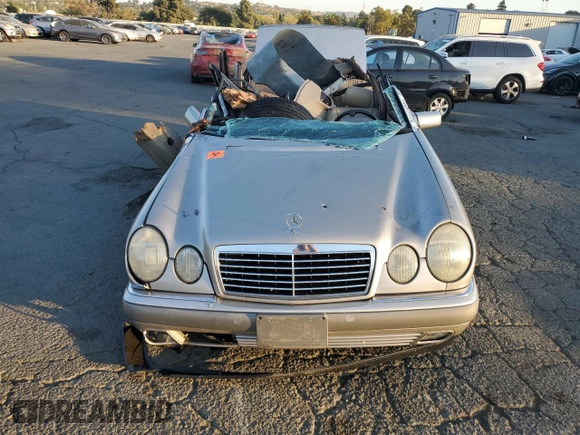 1997 Mercedes-Benz E-Class with VIN WDBJF55F8VA415967, listed as a Copart auction lot 74144924 with 0 mi miles and Salvage Title. Bid and sale history available at carsss.com. Image 5.