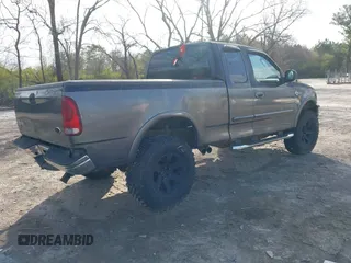 2003 Ford F-150 XL with VIN 1FTRX18L93NA51382, listed as a IAAI auction lot 41804153 with Not provided miles and . Bid and sale history available at DreamBid. Image 4.