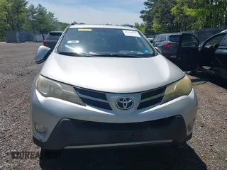 2013 Toyota RAV4 XLE with VIN JTMRFREV6DD011338, listed as a IAAI auction lot 42214088 with 202,537 mi miles and . Bid and sale history available at DreamBid. Image 12.