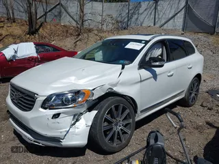 2014 Volvo XC60 R-Design Premier Plus with VIN YV4902DZ8E2545061, listed as a IAAI auction lot 42071863 with 90,718 mi miles and . Bid and sale history available at DreamBid. Image 2.